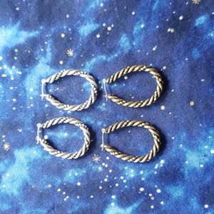 A set of two Premiere Designs hoop earrings.